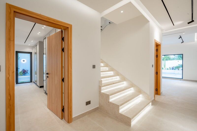 The Meadows villa renovation — staircase and hallway after renovation, Dubai