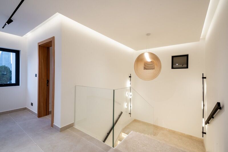 Renovated first-floor landing with new flooring and lighting — The Meadows villa