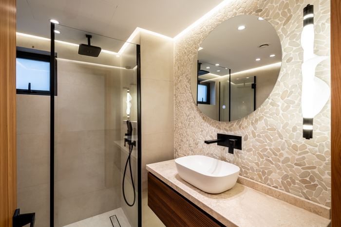Shower with Pebble Wall &mdash; completed Crownstone villa renovation, Dubai