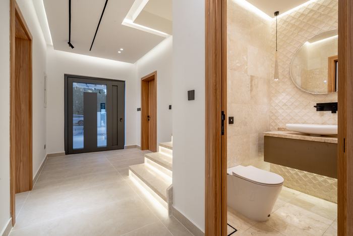Hallway with Ensuite Access &mdash; completed Crownstone villa renovation, Dubai