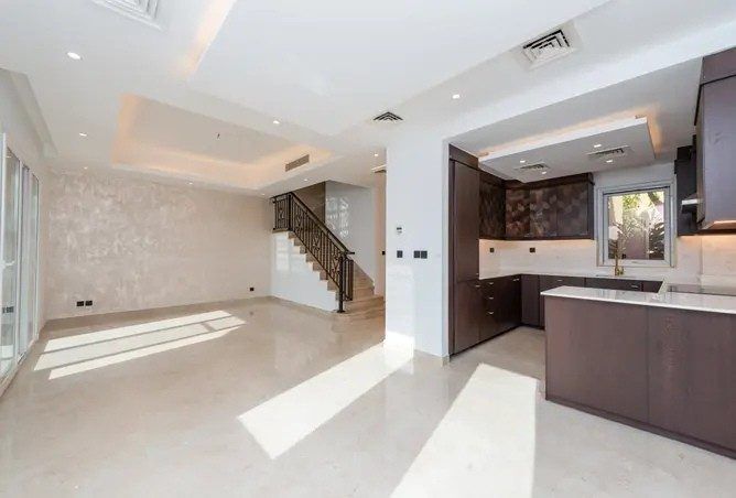 Crownstone-renovated Palmera 4 villa in Arabian Ranches — open-plan living, kitchen and dining area