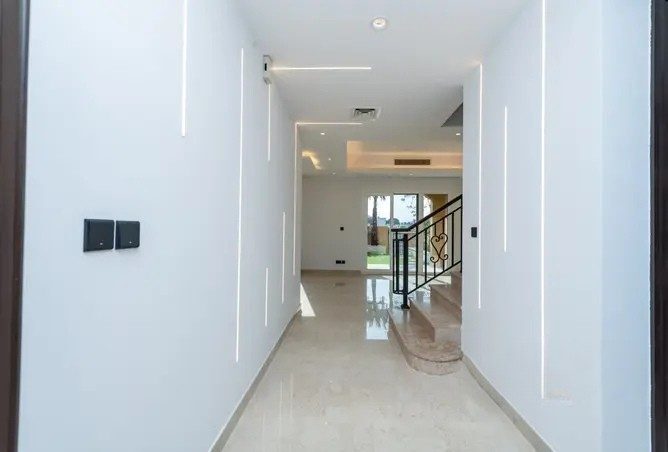 Palmera 4 villa hallway after renovation — bright, refinished corridor